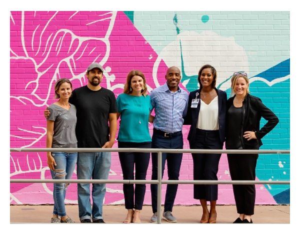 On hand for the unveiling of the mural were, from left, Vanessa and JP Parra, Sara Hackney, Ronde Barber, Qualenta Kivett and Tracy West. 