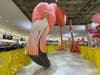 Once completed, the floor-to-ceiling immersive sculpture depicting a bright pink flamingo dipping its head beneath the surface of the water will be the centerpiece of a comprehensive public art exhibit that rivals most art galleries.