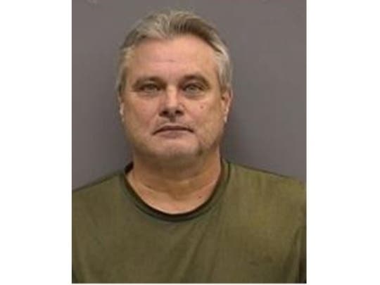 Tampa police arrested Paul Mumford Wednesday afternoon and charged him with 100 counts of child pornography.