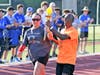 The event included the traditional passing of the Olympic torch. 