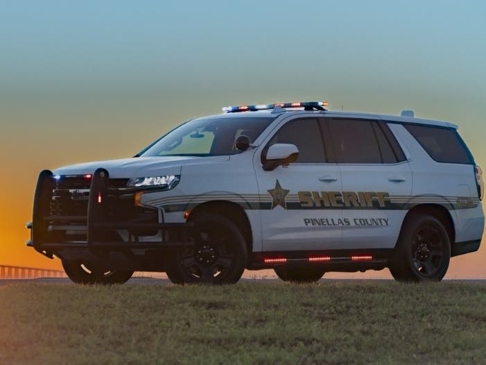 A 23-year-old woman escaped serious injury after she was run over by a sheriff's vehicle while sunbathing on the beach. 