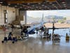 Airport operations personnel conduct engine maintenance on "Kermit" at the NOAA hangar at Lakeland Linder International Airport  before hurricane season.