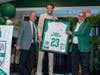 Knox displays his framed Tampa Catholic High School jersey. 