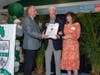 Principal Robert Lees thanks John and Lydia Oliva for their support.
