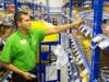 A Walmart Supercenter associates prepares an order for pickup.