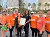 Tampa Police Chief Mary O'Connor presents a proclamation to Florida Moms Demand Action.