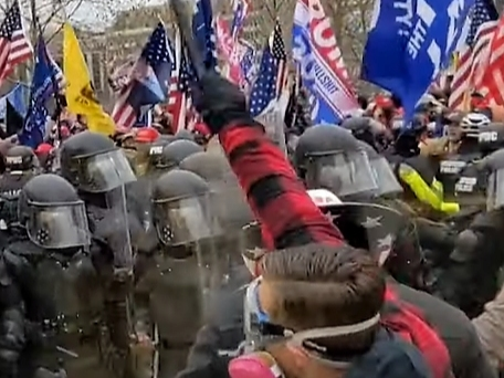 The Justice Department said Brian Boele, 59, of Lakeland and James Brett IV, 48, of Clearwater have been charged with civil disorder.