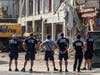 Firefighters watch as the 58-year-old Station 46 on north Clearwater Beach was demolished May 24. 