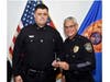 Two weeks after receiving his badge from Plant City Police Chief James Bradford, Officer Michal Pietrusinski helped save two children from a burning home while off duty. 