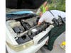 On Sunday, when a resident's car broke down in the parking lot of the Orient Road Jail, Hillsborough County sheriff's Deputy Rich Morales got down and dirty beneath the car's hood. 