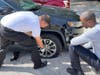 On Tuesday morning, Tampa Fire Rescue Capt. John Haintz and paramedic G. Thomas were photographed helping a resident change a flat tire. ​