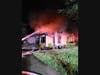 Engine 44 was first on the scene and confirmed heavy smoke and flames through the roof of the garage and central part of the house. Crews began attacking the blaze while protecting neighboring homes.