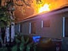 Engine 44 was first on the scene and confirmed heavy smoke and flames through the roof of the garage and central part of the house. Crews began attacking the blaze while protecting neighboring homes.