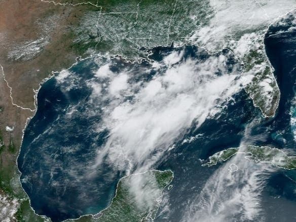 The trough of low pressure in the Gulf of Mexico has a 10 percent chance of developing into a tropical storm in the next 48 hours and a 30 percent of becoming a tropical storm in the next five days. 