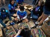 More than 500 volunteers fill backpacks with school supplies at last year's Big Backpack Build at Amalie Arena. 