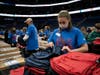 More than 500 volunteers fill backpacks with school supplies at last year's Big Backpack Build at Amalie Arena. 