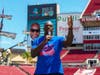 Titus O'Neil, aka Thaddeus Bullard, thanks the sponsors and donors that helped make last year's Back-to-School Bash a success.