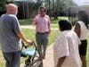 Tampa Councilman Luis Viera meets with Timber Falls residents who said they were given inflated bills of up to $12,000 and then evicted when they couldn't pay their apartment rent.