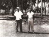 Willie Black, the golf course's first golf professional, and John Everhart pose at the Rogers Park Golf Course for Negroes in 1952.
