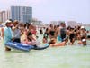 A large crowd gathered to watch the lifeguards and rescuers save the little dolphin. 
