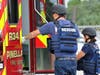 The most critically "injured" are loaded into ambulances at the triage center. 
