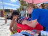 Kids also received other safety freebies while their parents picked up drowning prevention information. 
