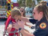 The fire rescue, in cooperation with Safe Kids Worldwide​, fitted children with life jackets provided by the Pinellas County Emergency Medical Services & Fire Administration​. 