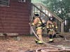 Six people were rescued from the home divided into eight apartments. 