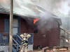 Firefighters arrived to find flames shooting through the windows of a first-story apartment. 