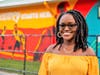 Award-winning artist Nneka Jones celebrates the completion of her mural at the Gwen Miller Community Center Aug. 11.