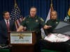Sheriff Grady Judd displayed one of the suitcases packed full of drugs.