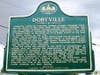 A historical marker pays tribute to the once-thriving Black neighborhood.
