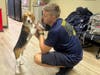 The fire rescue crew adopted Captain after learning that 4,000 beagles had been rescued from a research facility in Cumberland, Virginia. 
