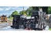 The driver was uninjured in the crash, but a large amount of gasoline was spilled along the highway and shoulder. 