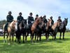 The Tampa Police Department's mounted unit stands at attention during the memorial services. 