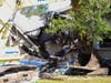Demolition took place Monday on Booker Washington's fire-damaged East Tampa home.