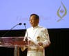 Dr. Hong, Tao-Tze, president of FOWPAL, delivers a speech, encouraging all people to foster a culture of peace with love and conscience in their different capacities during a gala dinner. (AP Images)
