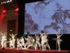 Members of FOWPAL present a cultural performance, portraying a story about the origin of martial arts. (AP Images)