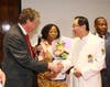 Dr. Hong, Tao-Tze, president of FOWPAL, right, is honored by Rhode Island Lieutenant Governor Daniel Mckee for fostering a culture of conscience, love, and peace at a gala dinner in New York, Feb. 19, 2020.