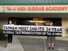 Tai Ji Men dizi hold a banner that reads, “TAIWAN MUST END ITS 24-YEAR ILLEGAL TAX PERSECUTION OF TAI JI MEN,” in front of the Tai Ji Men Qigong Academy in Cupertino, California on August 15, 2020.