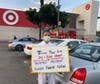 Tai Ji Men dizi, Ray Chen holds a sign that reads, “Taiwan Must End 24-Year Abuses of Tai Ji Men Members’ Human Rights Now,” in front of a Target store in California on August 15, 2020.