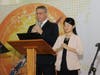 Masters of ceremonies lead viewers to conduct a 60-second silence to pray for the world at the International Ceremony of Love and Peace on October 16, 2022.