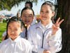 CiCi, an architectural designer and Harvard graduate, right, and her two daughters were part of the “five treasures” presentation. She introduced her daughters to Tai Ji Men Qigong, passing on its lifelong benefits.
