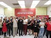Community leaders and residents joyfully form a galloping horse hand gesture, welcoming the Year of the Horse during the Lunar New Year celebration at Tai Ji Men Qigong Academy in Walnut.
