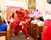 The auspicious lion dance brings festive joy and vibrant energy. 