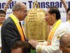 Mohamed Fathi Edrees, Permanent Observer of the African Union to the UN, left, shares a warm exchange with Dr. Hong, Tao-Tze, President of FOWPAL, after ringing the Bell of World Peace and Love. 