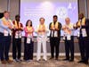 Dr. Hong, center, and distinguished guests take part in a lighting ceremony, symbolizing the illumination of oneself and the world through conscience, transparency, and integrity.
