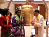 Dr. Princess Asie Kabuki Ocansey, center, and Dr. Hong had a warm exchange before she rang the Bell of World Peace and Love.
