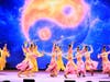 Female sword dancers wield traditional blades in a dynamic Tai Ji formation, symbolizing harmony, peace, and balance.