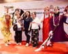 Audience members pose with performers dressed as characters from Journey to the West prior to the cultural performance celebrating Tai Ji Men Qigong Academy’s 60th anniversary.